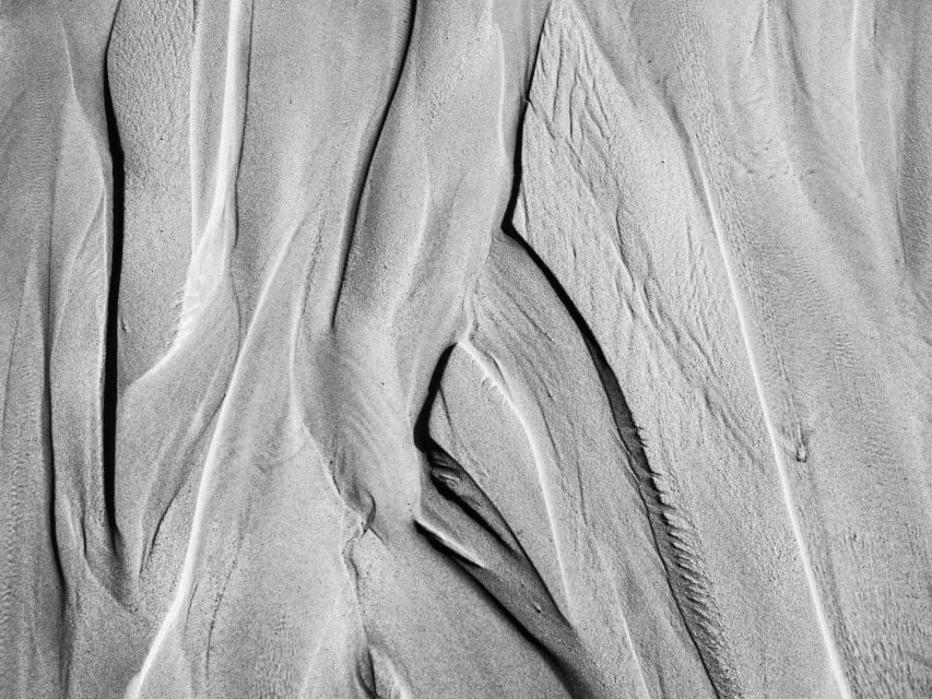 Look for scenes with texture, wooden buildings, cobbled pavements, brick walls &ndash; these will all work well when converted to mono.